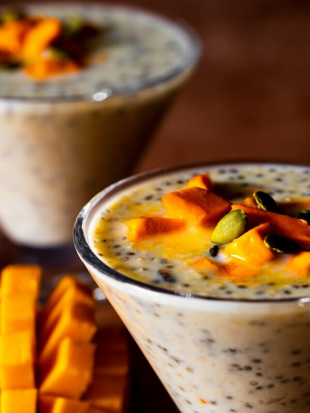 a close up of two glasses of food on a table