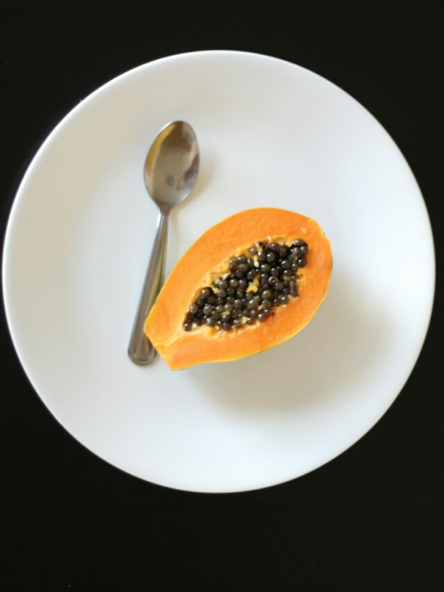 orange fruit on white ceramic bowl