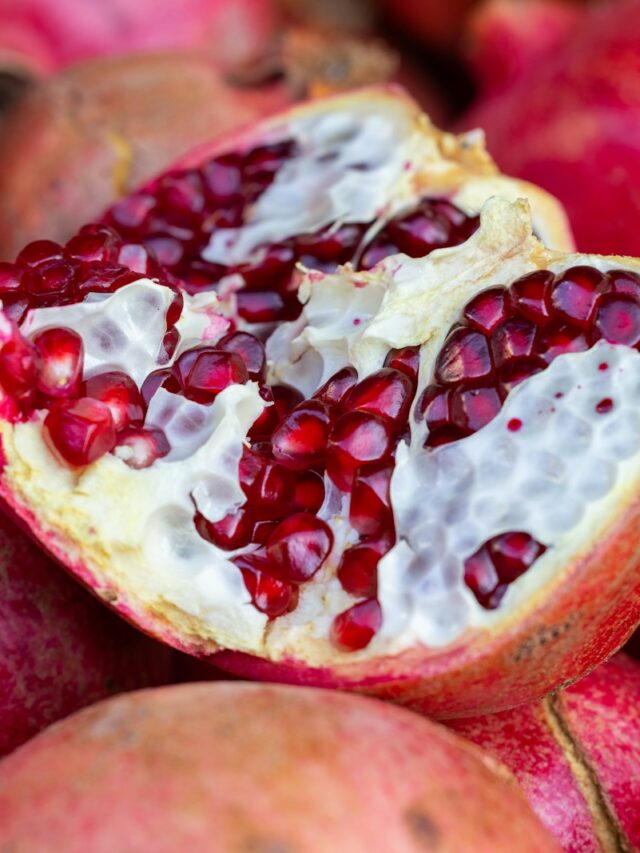 a close up of a pomegranate cut in half