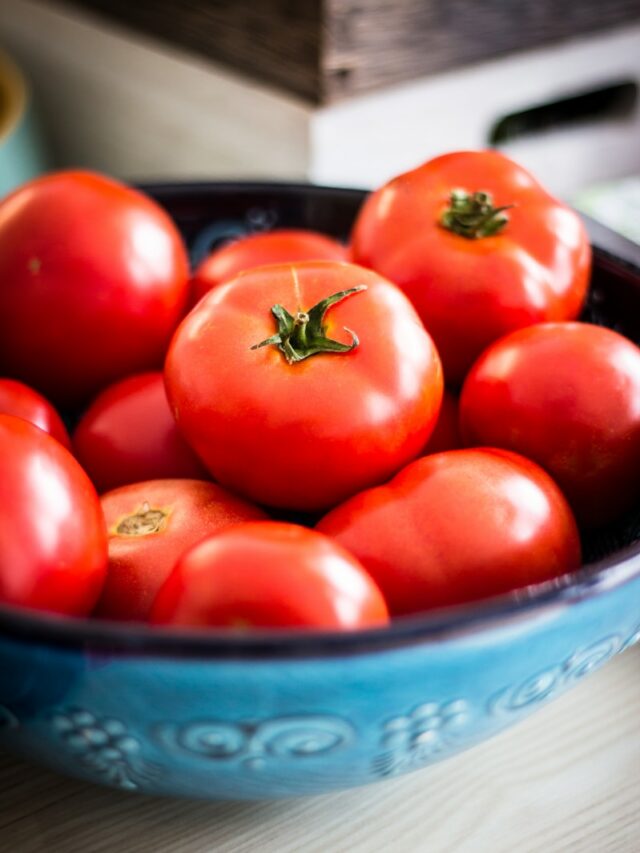 a bowl of red tomatoes