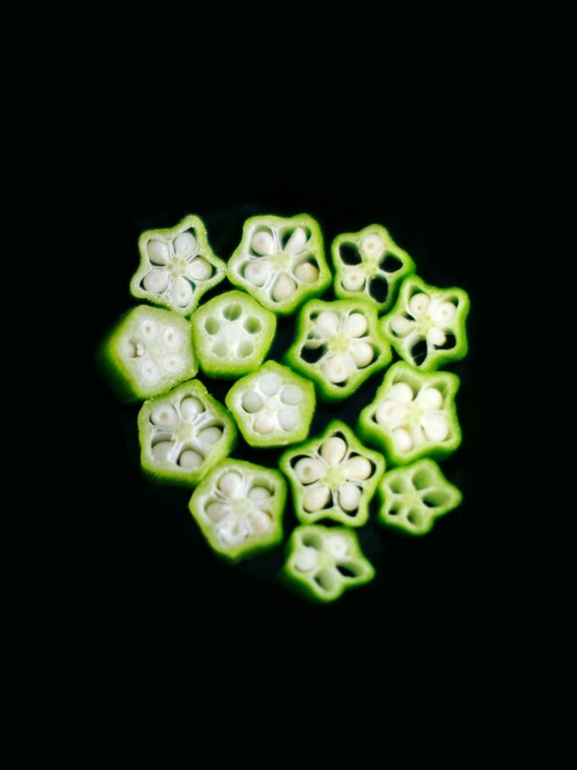 green round fruit on white background