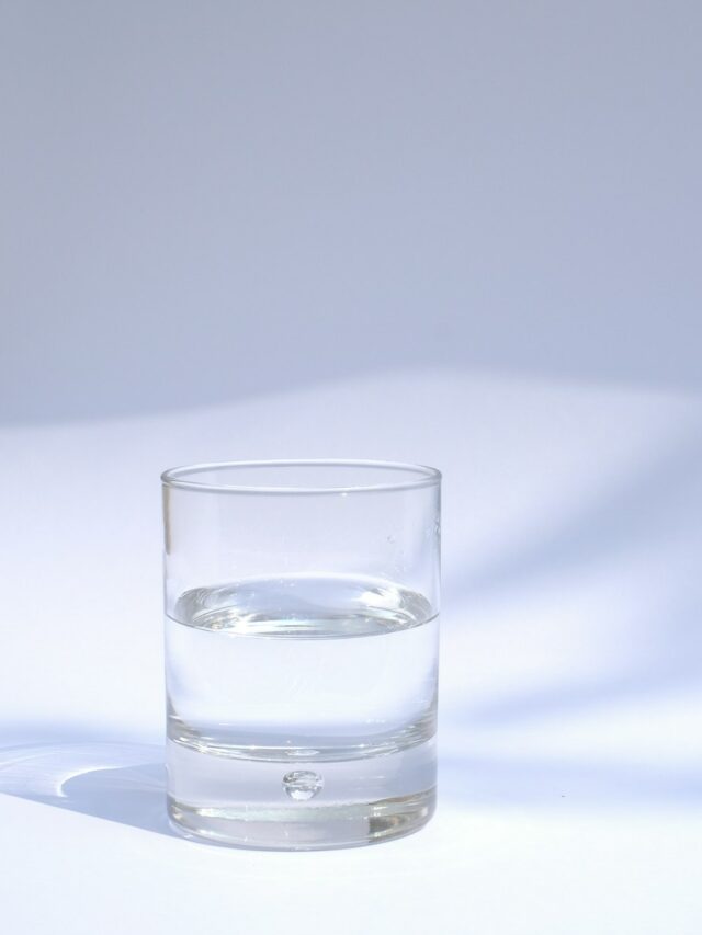 clear drinking glass filled with water